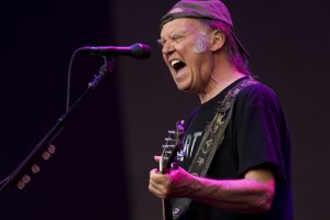 LONDON, ENGLAND - JULY 12: Neil Young and Crazy Horse perform on stage at British Summer Time Festival>> at Hyde Park on July 12, 2014 in London, United Kingdom. (Photo by Tristan Fewings/Getty Images)